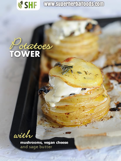 Potatoes tower with mushrooms, cheese and sage butter